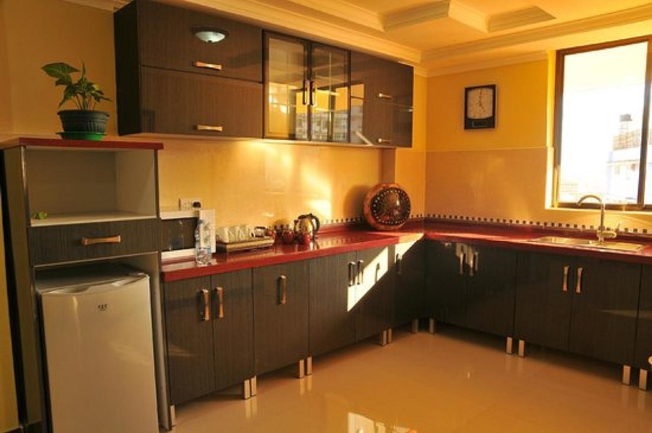 Urban Rose Hotel & Apartments Дар-эс-Саламе Экстерьер фото